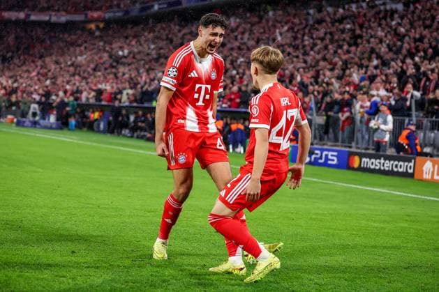 22 10 2025, Football, UEFA Champions League, FC Bayern München Club Brugge, Allianz Arena, Season 2025 2026 Goal celebration after the goal to 1 0 by scorer Lennart Karl FC Bayern Muenchen 42 together with Aleksandar Pavlovic FC Bayern Muenchen 45 Regulations prohibit any use of photographs as image sequences and or quasi video Bayern Germany