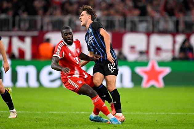 Bayern Munchen v Club Brugge - UEFA Champions League MUNICH, GERMANY - OCTOBER 22 : Upamecano Dayot defender of Bayern Munchen with a tackle on Audoor Lynnt midfielder of Club Brugge during the UEFA Champions League 2025 26 League Phase MD3 match between Bayern Munchen and Club Brugge on October 22, 2025 in Munich, Germany, 22 10 2025 Munich Germany  Copyright: xTomasxSiskx