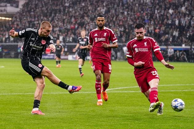 2025-10-22 Eintracht Frankfurt v Liverpool FC - UEFA Champions League 2025 26 League Phase MD3 FRANKFURT AM MAIN, GERMANY - OCTOBER 22: Rasmus Kristensen of Eintracht Frankfurt shoots at goal during the UEFA Champions League 2025 26 League Phase MD3 match between Eintracht Frankfurt and Liverpool FC at Deutsche Bank Park on October 22, 2025 in Frankfurt am Main, Germany. Frankfurt am Main Deutsche Bank Park Germany Content not available for redistribution in The Netherlands directly or indirectly through any third parties. Copyright: xAndrexWeeningx
