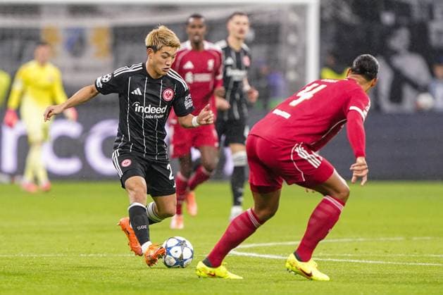 2025-10-22 Eintracht Frankfurt v Liverpool FC - UEFA Champions League 2025 26 League Phase MD3 FRANKFURT AM MAIN, GERMANY - OCTOBER 22: Ritsu Doan of Eintracht Frankfurt runs with the ball during the UEFA Champions League 2025 26 League Phase MD3 match between Eintracht Frankfurt and Liverpool FC at Deutsche Bank Park on October 22, 2025 in Frankfurt am Main, Germany. Frankfurt am Main Deutsche Bank Park Germany Content not available for redistribution in The Netherlands directly or indirectly through any third parties. Copyright: xAndrexWeeningx