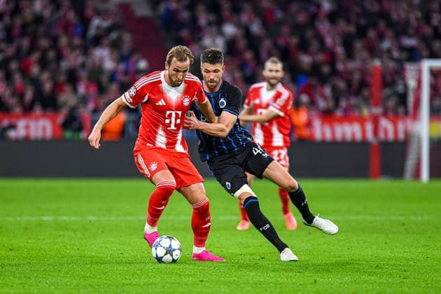 Harry Kane 9 Bayern and Brandon Mechele 44 Bruges in action during the Champions League match FC Bayern Munich Club Bürgge on 22 10 2025 Munich Allianz Arena Bayern Germany