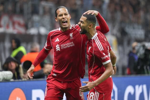 Eintracht Frankfurt FC Liverpool, UEFA Champions League Virgil van Dijk Liverpool FC, 4 and Cody Gakpo Liverpool FC, 18 cheer after scoring the UEFA Champions League matchday 3 goal between Eintracht Frankfurt and Liverpool FC on October 22, 2025 at Deutsche Bank Park in Frankfurt am Main , Frankfurt am Main Hessen Germany Deutsche Bank Park