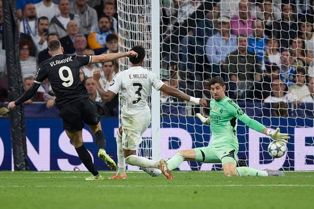Tibaut Courtois (Real Madrid CF) blocks the ball during the UEFA Champions League 2025 26 League Phase MD3 match between Real Madrid C.F. v Juventus at Estadio Santiago Bernabeu on October 22, 2025 in Madrid, Spain. (Photo by Manu Reino DeFodi Images) Tibaut Courtois Real Madrid CF blocks the ball during the UEFA Champions League 2025 26 League Phase MD3 match between Real Madrid C F v Juventus at Estadio Santiago Bernabeu on October 22, 2025 in Madrid, Spain Photo by Manu Reino DeFodi Images