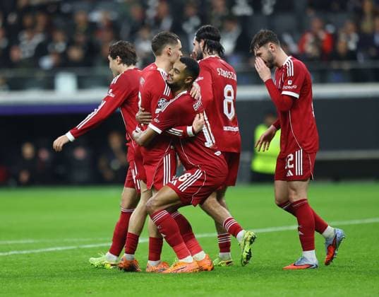 Cody Gakpo of Liverpool celebrates scoring his sides fourth goal with team-mate Florian Wirtz of Liverpool Eintracht Frankfurt v Liverpool, UEFA Champions League, Group Stage, Football, Deutsche Bank Park, Frankfurt, Germany - 22 Oct 2025Frankfurt Deutsche Bank Park Germany EDITORIAL USE ONLY No use with unauthorised audio, video, data, fixture lists, club league logos or live services. Online in-match use limited to 120 images, no video emulation. No use in betting, games or single club league player publications. Copyright: xMichaelxZemanek Shutterstockx 15558828ay