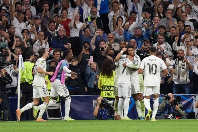 Jude Bellingham of Real Madrid CF celebrates with his teammates after scoring a goal Real Madrid v Juventus, UEFA Champions League, Football, Estadio Santiago Bernabeu, Madrid, Spain - 22 Oct 2025Madrid Estadio Santiago Bernabu Spain EDITORIAL USE ONLY No use with unauthorised audio, video, data, fixture lists, club league logos or live services. Online in-match use limited to 120 images, no video emulation. No use in betting, games or single club league player publications.  Copyright: xRubenxAlbarran Shutterstockx 15564869dh