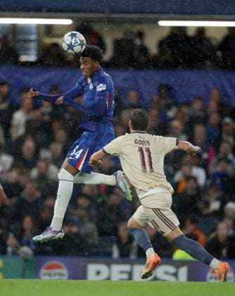Chelsea FC v AFC Ajax - UEFA Champions League 2025 26 League Phase MD3 Josh Acheampong of Chelsea and Mika Godts of Ajax challenge during the UEFA Champions League 2025 26 League Phase MD3 match between Chelsea FC and AFC Ajax at Stamford Bridge on October 22, 2025 in London, England. London Stamford Bridge England United Kingdom Copyright: xNealxSimpson Sportsphoto APLx 14139489