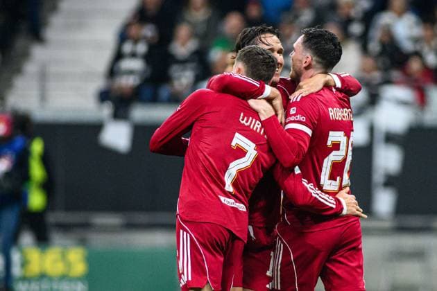 FRANKFURT, GERMANY - 22 OCTOBER, 2025: Florian Wirtz, Andy Robertson, Federico Chiesa - UEFA Champions League, match SG Eintracht Frankfurt vs Liverpool FC at Deutsche Bank Park.  Copyright: xx