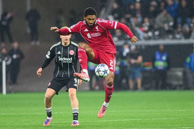 FRANKFURT, GERMANY - 22 OCTOBER, 2025: Joe Gomez, Jonathan Burkardt - UEFA Champions League, match SG Eintracht Frankfurt vs Liverpool FC at Deutsche Bank Park.  Copyright: xx