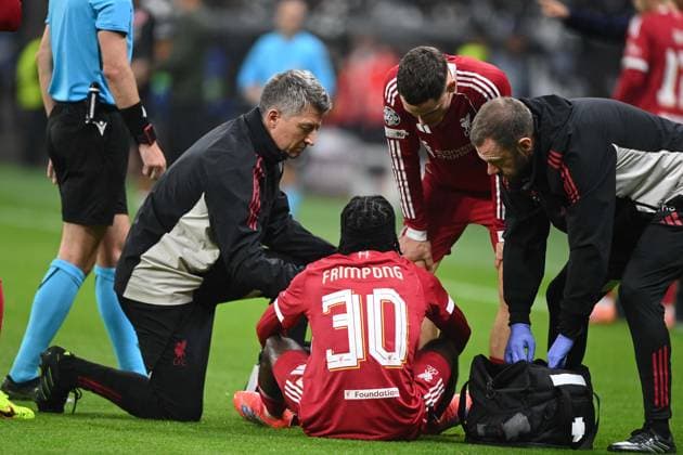 Jeremie FRIMPONG Liverpool FC injured, injury, being treated, football UEFA Champions League group stage 3 matchday, matchday3, Eintracht Frankfurt F Liverpool FC LIV 1 5 on 22 10 2025 at Deutsche Bank Park, Frankfurt Germany UEFA regulations prohibit any use of photographs as image sequences and or quasi video Â