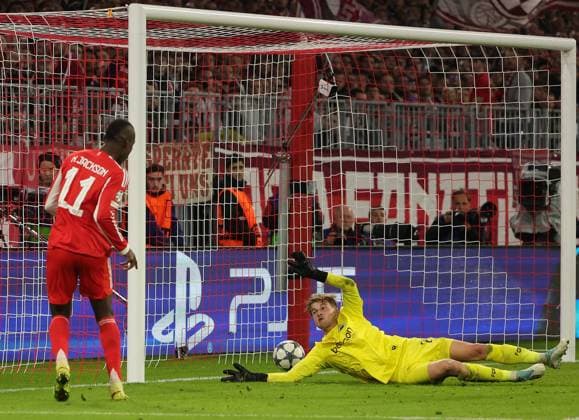 (251023) -- MUNICH, Oct. 23, 2025 -- Nicolas Jackson (L) of Bayern Munich shoots to score during the UEFA Champions League football match between Bayern Munich and Club Brugge in Munich, Germany, Oct. 22, 2025. (Photo by Xinhua) (SP)GERMANY-MUNICH-FOOTBALL-UEFA CHAMPIONS LEAGUE-BAYERN MUNICH VS BRUGGE PhilippexRuiz 