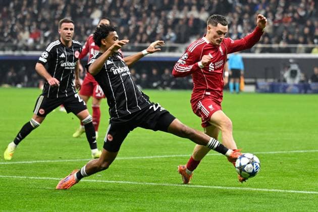 (251023) -- FRANKFURT, Oct. 23, 2025 -- Nathaniel Brown (C) of Eintracht Frankfurt vies with Florian Wirtz (R) of Liverpool FC during the UEFA Champions League group stage 3rd round match between Eintracht Frankfurt and Liverpool FC in Frankfurt, Germany, Oct. 22, 2025. (Photo by Xinhua) (SP)GERMANY-FRANKFURT-FOOTBALL-UEFA CHAMPIONS LEAGUE-FRANKFURT VS LIVERPOOL FC UlrichxHufnagel 
