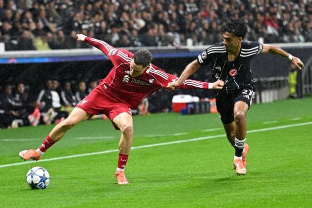 (251023) -- FRANKFURT, Oct. 23, 2025 -- Nathaniel Brown (R) of Eintracht Frankfurt vies with Florian Wirtz of Liverpool FC during the UEFA Champions League group stage 3rd round match between Eintracht Frankfurt and Liverpool FC in Frankfurt, Germany, Oct. 22, 2025. (Photo by Xinhua) (SP)GERMANY-FRANKFURT-FOOTBALL-UEFA CHAMPIONS LEAGUE-FRANKFURT VS LIVERPOOL FC UlrichxHufnagel 