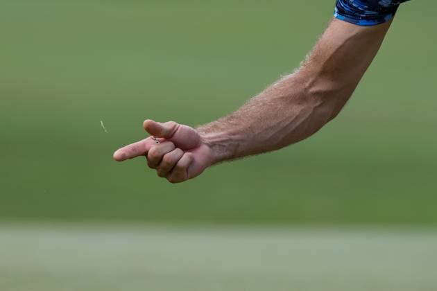 International Series golf in the Philippines Dustin Johnson of the USA removes grass during the International Series Philippines in Sta. Elena Golf & Country Club, Laguna, south of Manila, Philippines on October 23, 2025. The tournament will run from October 23 to 26, 2025. LAGUNA PHILIPPINES  Copyright: xMatrixxImages MarkxCristinox