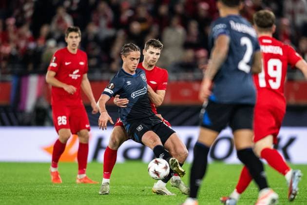 251023 Thelo Aasgaard of Rangers and Jacob Ebsen Sorensen of Brann during the UEFA Europa League football match between Brann and Rangers on October 23, 2025 in Bergen Photo Marius Simensen BILDBYRAN COP 238 MM0046 fotboll football soccer fotball uefa europa league brann rangers bbeng  Copyright: MARIUSxSIMENSEN BB251023BB614
