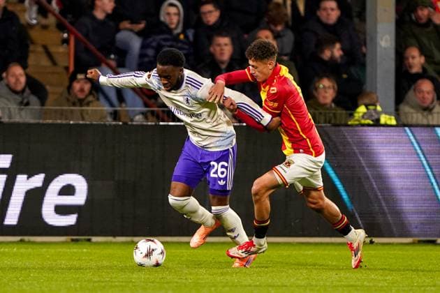 2025-10-23 Go Ahead Eagles v Aston Villa FC - UEFA Europa League 2025 26 League Phase MD3 DEVENTER, NETHERLANDS - OCTOBER 23: Lamare Bogarde of Aston Villa battles for possession with Yassir Salah Rahmouni of Go Ahead Eagles during the UEFA Europa League 2025 26 League Phase MD3 match between Go Ahead Eagles and Aston Villa FC at Adelaarshorst on October 23, 2025 in Deventer, Netherlands. Deventer Adelaarshorst Netherlands Content not available for redistribution in The Netherlands directly or indirectly through any third parties. Copyright: xAndrexWeeningx