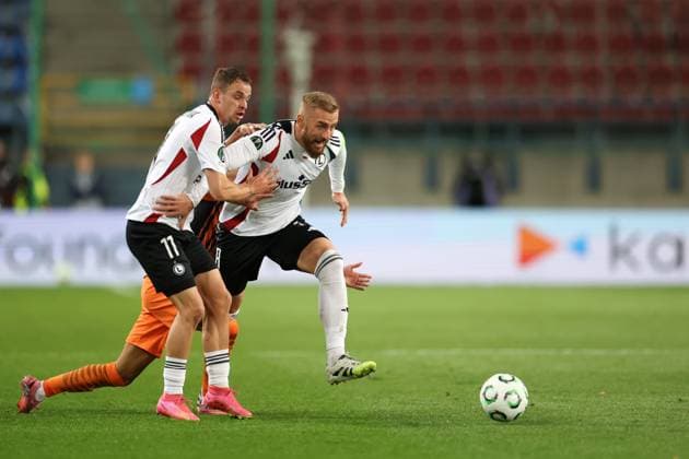 KRAKOW 23.10.2025 MECZ 2. KOLEJKA LIGA KONFERENCJI SEZON 2025 26: SZACHTAR DONIECK - LEGIA WARSZAWA --- UEFA CONFERENCE LEAGUE MATCH IN CRACOW: SHAKHTAR DONETSK - LEGIA WARSAW KACPER CHODYNA RAFAL AUGUSTYNIAK FOT. PIOTR KUCZA FOTOPYK NEWSPIX.PL --- newspix.pl 
