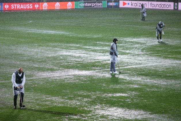 HNK Rijeka v AC Sparta Praha: UEFA Conference League A groundsmen attempts to release water from the waterlogged pitch after play is suspended due to heavy rain during the UEFA Conference League group phase matchday 2 between HNK Rijeka and AC Sparta Praha at HNK Rijeka Stadium on October 23, 2025. in Rijeka, Croatia.  NelxPavletic PIXSELL
