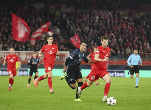 Bojan Miovski of Rangers in action with Jacob Sorensen of Brann during the UEFA Europa League league phase match at the Brann Stadion, Bergen. SK Brann v Rangers - UEFA Europa League - League Phase - Brann Stadion, Bergen, Norway - 23 Oct 2025Bergen Brann Stadion United Kingdom EDITORIAL USE ONLY  Copyright: xO Rourke RangersxFC Shutterstockx 15577747dp