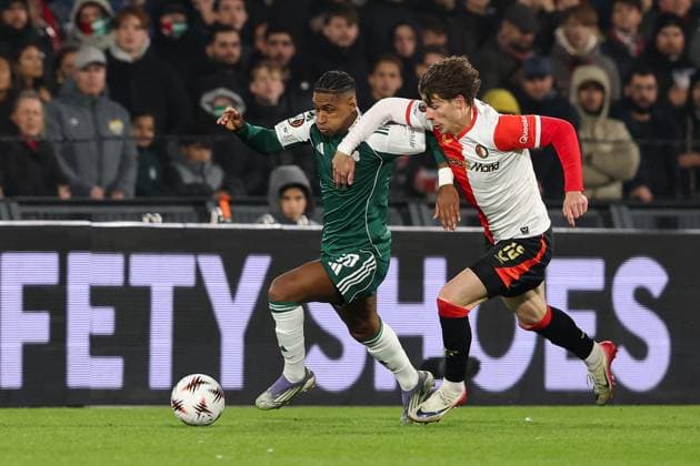 2025-10-23 Feyenoord v Panathinaikos - UEFA Europa League, League phase, MD3 ROTTERDAM, NETHERLANDS - OCTOBER 23: Tete of Panathinaikos battles for the ball with Jordan Bos of Feyenoord during the UEFA Europa League, League phase, MD3 match between Feyenoord and Panathinaikos at Stadion Feijenoord on October 23, 2025 in Rotterdam, Netherlands. Rotterdam Stadion Feijenoord Netherlands Content not available for redistribution in The Netherlands directly or indirectly through any third parties. Copyright: xHansxvanxderxValkx