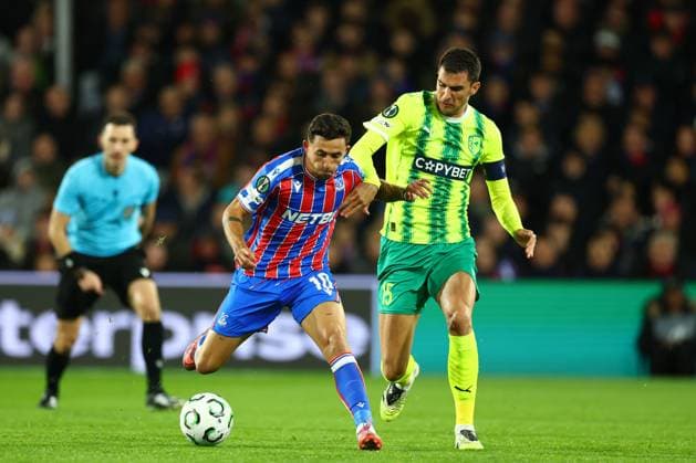 Yeremi Pino of Crystal Palace under pressure from Hrvoje Milicevic of AEK Larnaca Crystal Palace v AEK Larnaca, UEFA Conference League, Group Stage, Football, Selhurst Park, London, UK - 23 Oct 2025London Selhurst Park United Kingdom EDITORIAL USE ONLY No use with unauthorised audio, video, data, fixture lists, club league logos or live services. Online in-match use limited to 120 images, no video emulation. No use in betting, games or single club league player publications. Copyright: xSimonxDael Shutterstockx 15567836h
