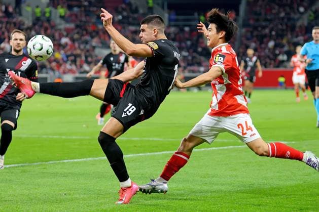 Mainz, Germany October 23, 2025 Conference League 2025 2026 FSV Mainz 05 vs Zrinjski Mostar In the picture from left in the duel Marko Vranjkovic Zrinjski Mostar against Sota Kawasaki Mainz Mewa Arena Rheinland Pfalz Copyright: xFotostandx xRacochax