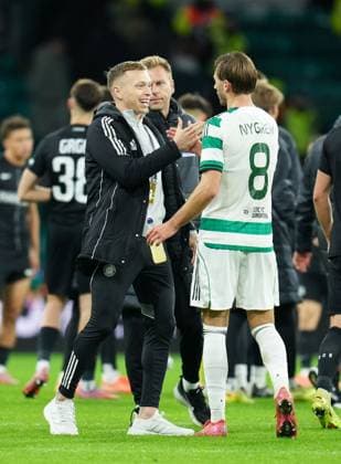 Alistair Johnston of Celtic on the pitch with Benjamin Nygren of Celtic at full-time. Final score Celtic 2 Sturm Graz 1. Celtic v Sturm Graz, UEFA Europa League, Group Stage, Football, Celtic Park, Glasgow, Scotland, UK - 23 Oct 2025Glasgow Celtic Park United Kingdom EDITORIAL USE ONLY No use with unauthorised audio, video, data, fixture lists, club league logos or live services. Online in-match use limited to 120 images, no video emulation. No use in betting, games or single club league player publications. Copyright: xStuartxWallace Shutterstockx 15567786dp