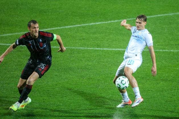HNK Rijeka v AC Sparta Praha: UEFA Conference League Asger Sorensen of Sparta Praha and Toni Fruk of HNK Rijeka competes for the ball during the UEFA Conference League group phase matchday 2 between HNK Rijeka and AC Sparta Praha at HNK Rijeka Stadium on October 23, 2025. in Rijeka, Croatia.  NelxPavletic PIXSELL