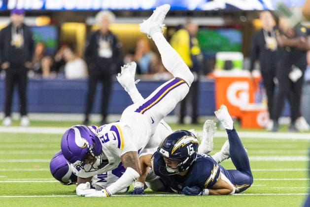October 23, 2025, Los Angeles, California, USA: Minnesota Vikings safety Joshua Metellus 44 catches an interception intended for Los Angeles Chargers wide receiver Ladd McConkey 15 during an NFL, American Football Herren, USA football game at SoFi Stadium, Thursday Oct. 23, 2025, in Inglewood, Calif. Los Angeles USA - ZUMAc68_ 20251023_zaf_c68_003 Copyright: xRingoxChiux
