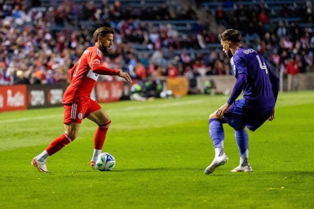 October 23, 2025, Bridgeview, Illinois, United States: Chicago Fire Forward Philip Zinckernagel (11) and Orlando City Defender David Brekalo (4) in action during the Chicago Fire FC vs Orlando City Wildcard match at SeatGeek Stadium. Final Score: Chicago Fire 3:1 Orlando City Bridgeview United States - ZUMAs197 20251023_aaa_s197_379 Copyright: xRajxChavdax
