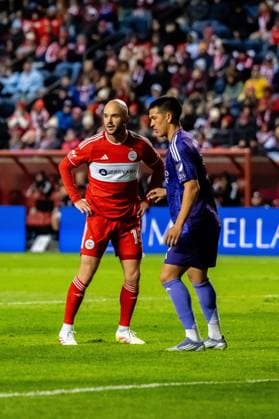 October 23, 2025, Bridgeview, Illinois, United States: Orlando City Midfielder CÃ sar Araujo (5) and Chicago Fire Defender Andrew Gutman (15) in action during the Chicago Fire FC vs Orlando City Wildcard match at SeatGeek Stadium. Final Score: Chicago Fire 3:1 Orlando City Bridgeview United States - ZUMAs197 20251023_aaa_s197_383 Copyright: xRajxChavdax