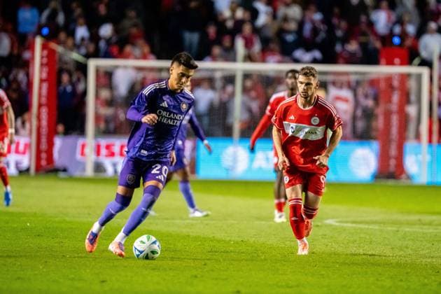 October 23, 2025, Bridgeview, Illinois, United States: Orlando City Midfielder Eduard Atuesta (20) and Chicago Fire Forward Hugo Cuypers (9) in action during the Chicago Fire FC vs Orlando City Wildcard match at SeatGeek Stadium. Final Score: Chicago Fire 3:1 Orlando City Bridgeview United States - ZUMAs197 20251023_aaa_s197_399 Copyright: xRajxChavdax