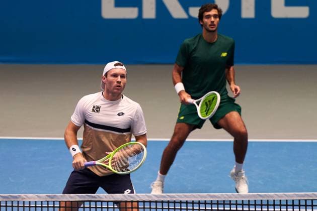 Lucas Miedler of Austria (front) and Francisco Cabral of Portugal during the quarter-final match of Erste Bank Open 2025 at Marx Halle on October 24, 2025 in Vienna, Austria. (Photo by Camilla Stolen, Imago) Vienna Austria Copyright: xCamillaxStolenx L1073318