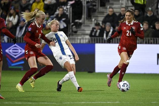 Finnish Eveliina Summanen shoots and Danish Amalie Vangsgaard (left) and Mille Gejl are looking on during women s Nations s League football match Finland vs Denmark in Tampere, Finland on 24th October, 2025. Tampere Finland LKFTJK20251024192735GHXF  Copyright: xAnttixAimo-Koivistox LKFTJK20251024192735GHXF