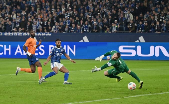 Moussa Sylla FC Schalke 04 scores against goalkeeper Marcel Schuhen SV Darmstadt 98 to make it 1 0 24 10 2025, Soccer 2 Bundesliga, Season 2025 2026, 10 Matchday, FC Schalke 04 SV Darmstadt 98 DFL regulations prohibit any use of photographs as image sequences and or quasi video Gelsenkirchen Veltins Arena Nordrhein Westfalen Germany Team2