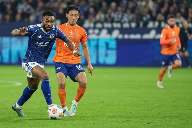 2 Bundesliga FC Schalke 04 SV Darmstadt 98 on 24 10 2025 at the Veltins Arena in Schalke Moussa Sylla Schalke 9 vs Hiroki Akiyama Darmstadt 16 MH