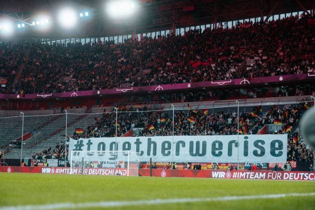 24 10 25, Women, Football, UEFA Womens Nations League, Semi-final, Season 2025, Germany France Choreography of the German fans before the match with the banner togetherwerise Düsseldorf MERKUR SPIEL ARENA NRW Germany