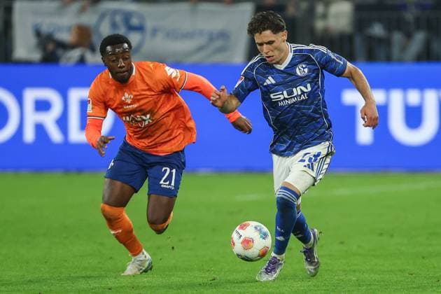 2 Bundesliga FC Schalke 04 SV Darmstadt 98 on 24 10 2025 at the Veltins Arena in Schalke Soufiane El Faouzi Schalke 23 vs Merveille Papela Darmstadt 21 MH