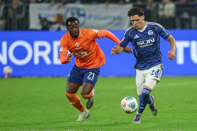 2 Bundesliga FC Schalke 04 SV Darmstadt 98 on 24 10 2025 at the Veltins Arena in Schalke Soufiane El Faouzi Schalke 23 vs Merveille Papela Darmstadt 21 MH