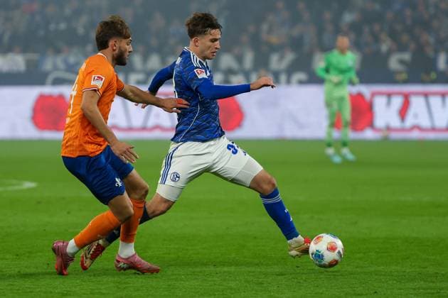 2 Bundesliga FC Schalke 04 SV Darmstadt 98 on 24 10 2025 in the Veltins Arena at Schalke Vitalie Becker Schalke 33 vs Killian Corredor Darmstadt 34 MH