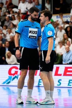 Huettenberg HBL 25 26 TV Huettenberg SG BBM Bietigheim from left Referees Fabian Riedel and Rick Herrmann Huettenberg Sports Center Germany