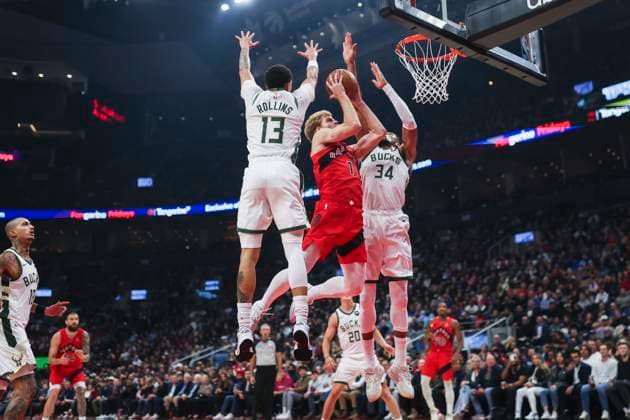 October 24, 2025, Toronto, On, Canada: Toronto Raptors Gradey Dick (1) drives to the net between Milwaukee Bucks Ryan Rollins (13) and Giannis Antetokounmpo (34) during first half NBA, Basketball Herren, USA basketball action in Toronto on Friday, October 24, 2025. Canada News - October 24, 2025  - ZUMAc35_ 20251024_zaf_c35_058 Copyright: xNickxIwanyshynx