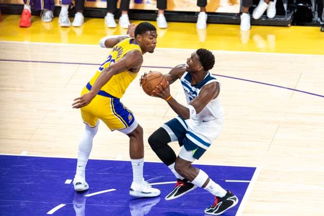 October 24, 2025, Los Angeles, California, USA: Minnesota Timberwolves Anthony Edwards (5) is defended by Los Angeles LakersÃ¢â‚¬â ¢ Luka DonÄÂiÄ¡ (77) during an NBA, Basketball Herren, USA basketball game, in Los Angeles Friday, Oct. 24, 2025. Los Angeles USA - ZUMAc68_ 20251024_zaf_c68_010 Copyright: xRingoxChiux