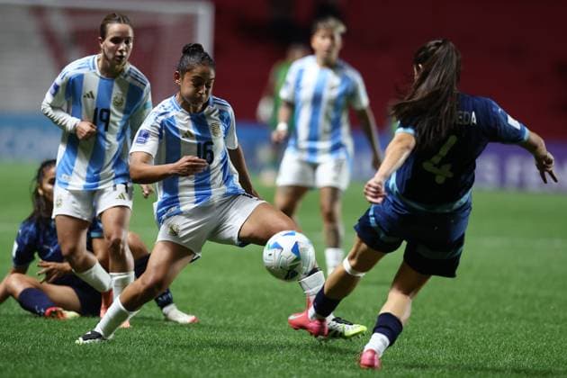 Argentina s midfielder Sofia Dominguez C vies for the ball with Paraguay s defender Daisy Ojeda R during the CONMEBOL Women s Nations League football match, qualifier for the 2027 World Cup in Brazil, between Argentina and Paraguay, at the Diego Armando Maradona stadium in Buenos Aires, Argentina on October 24, 2025 BUENOS AIRES ARGENTINA Copyright: xALEJANDROxPAGNIx