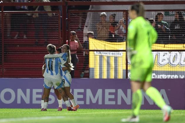 Argentina s midfielder Agostina Holzheier C celebrates with teammates after scoring the team™s second goal during the CONMEBOL Women s Nations League football match, qualifier for the 2027 World Cup in Brazil, between Argentina and Paraguay, at the Diego Armando Maradona stadium in Buenos Aires, Argentina on October 24, 2025 BUENOS AIRES ARGENTINA Copyright: xALEJANDROxPAGNIx