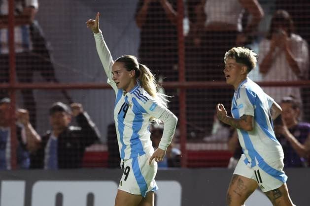 Argentina s midfielder Agostina Holzheier L celebrates after scoring the team™s second goal during the CONMEBOL Women s Nations League football match, qualifier for the 2027 World Cup in Brazil, between Argentina and Paraguay, at the Diego Armando Maradona stadium in Buenos Aires, Argentina on October 24, 2025 BUENOS AIRES ARGENTINA Copyright: xALEJANDROxPAGNIx