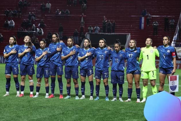 Paraguay™s players sing the national anthem before the CONMEBOL Women s Nations League football match, qualifier for the 2027 World Cup in Brazil, between Argentina and Paraguay, at the Diego Armando Maradona stadium in Buenos Aires, Argentina on October 24, 2025 BUENOS AIRES ARGENTINA Copyright: xALEJANDROxPAGNIx