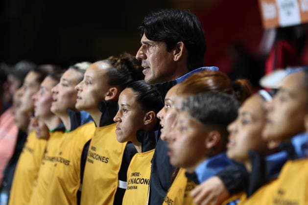 Argentina s head coach German Portanova C and players sing the national anthem before the CONMEBOL Women s Nations League football match, qualifier for the 2027 World Cup in Brazil, between Argentina and Paraguay, at the Diego Armando Maradona stadium in Buenos Aires, Argentina on October 24, 2025 BUENOS AIRES ARGENTINA Copyright: xALEJANDROxPAGNIx