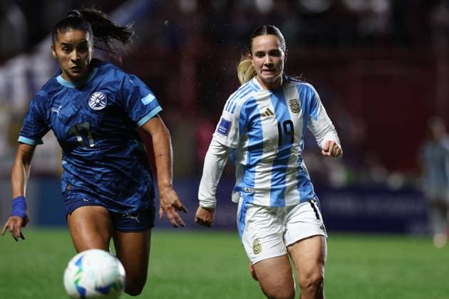Paraguay s defender Camila Arrieta L and Argentina s midfielder Agostina Holzheier vie for the ball during the CONMEBOL Women s Nations League football match, qualifier for the 2027 World Cup in Brazil, between Argentina and Paraguay, at the Diego Armando Maradona stadium in Buenos Aires, Argentina on October 24, 2025 BUENOS AIRES ARGENTINA Copyright: xALEJANDROxPAGNIx