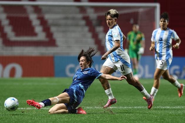 Paraguay s defender Naomi de Leon bottom L shoots the ball next Argentina s forward Yamila Rodriguez during the CONMEBOL Women s Nations League football match, qualifier for the 2027 World Cup in Brazil, between Argentina and Paraguay, at the Diego Armando Maradona stadium in Buenos Aires, Argentina on October 24, 2025 BUENOS AIRES ARGENTINA Copyright: xALEJANDROxPAGNIx
