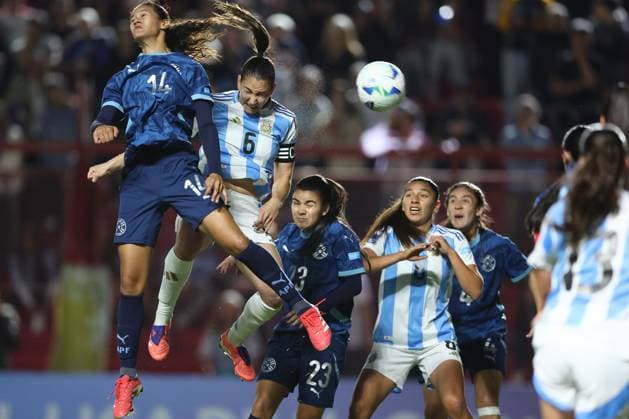 Argentina s defender Aldana Cometti 2nd L heads and scores the team™s first goal during the CONMEBOL Women s Nations League football match, qualifier for the 2027 World Cup in Brazil, between Argentina and Paraguay, at the Diego Armando Maradona stadium in Buenos Aires, Argentina on October 24, 2025 BUENOS AIRES ARGENTINA Copyright: xALEJANDROxPAGNIx